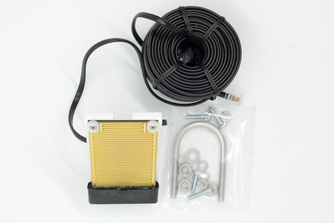 The Davis leaf wetness sensor, shown with its 12m cable and mounting hardware.